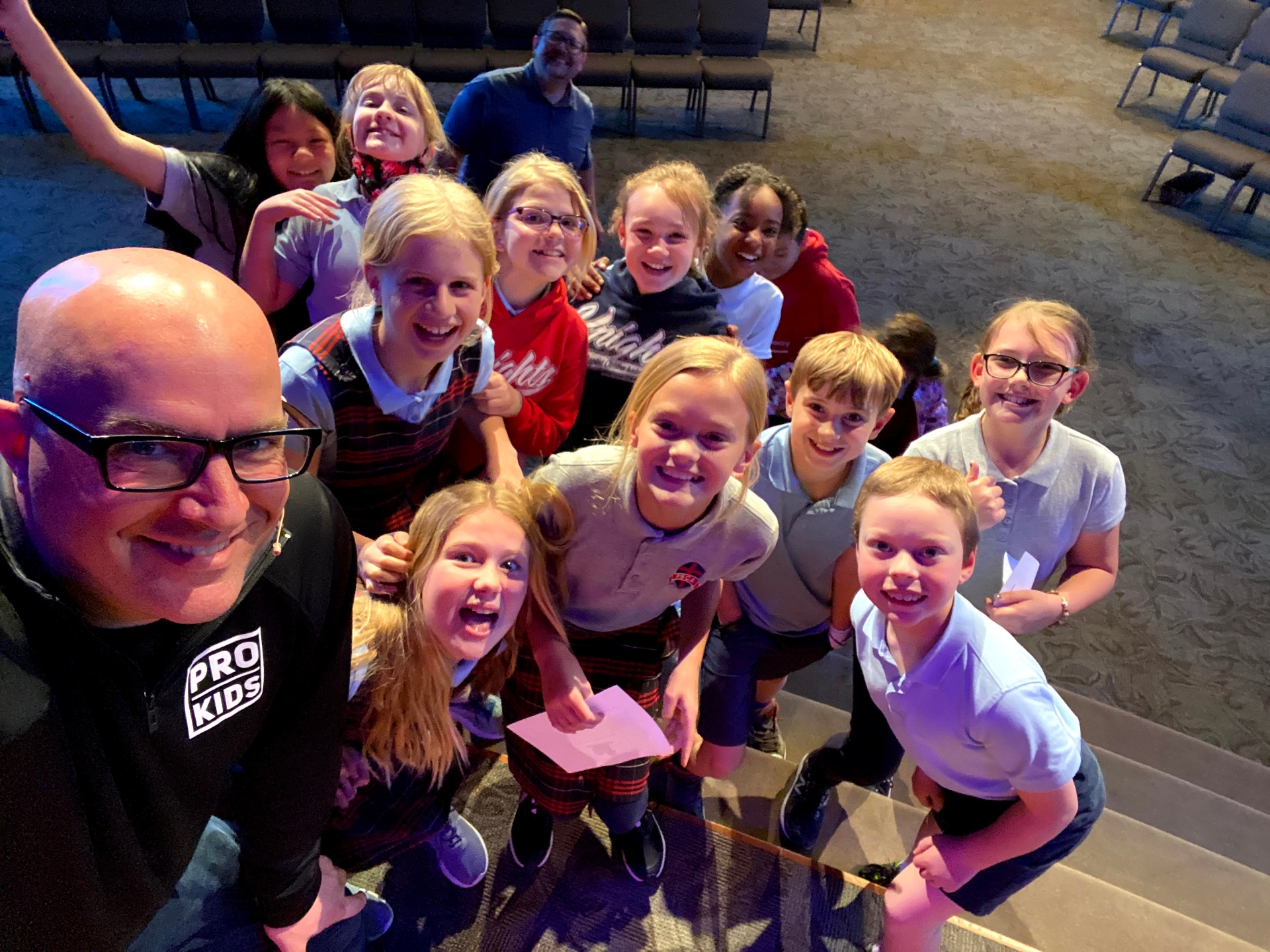 Catholic school students with Tim
