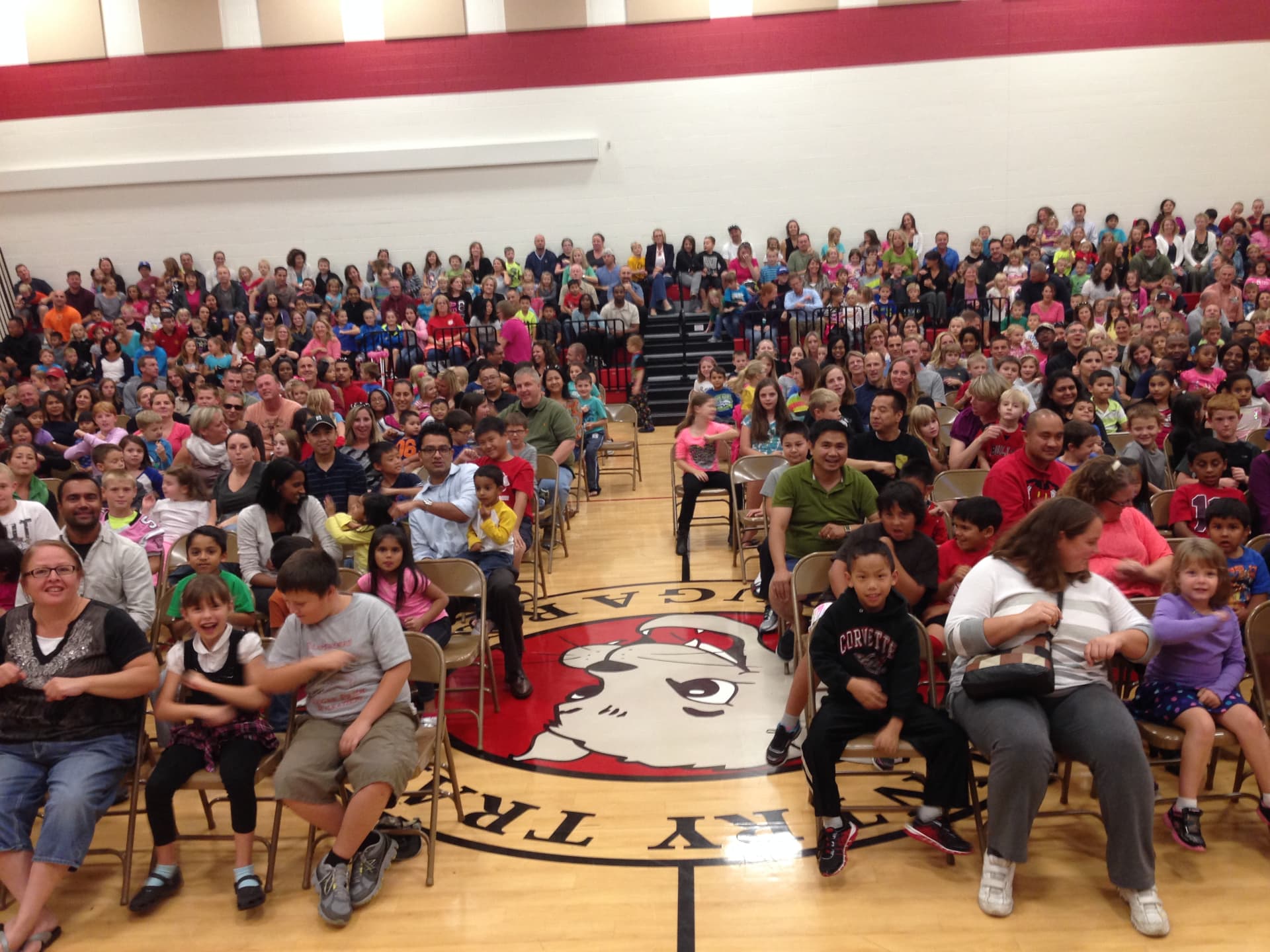 Country Trails families seated together for Family Night in 2014