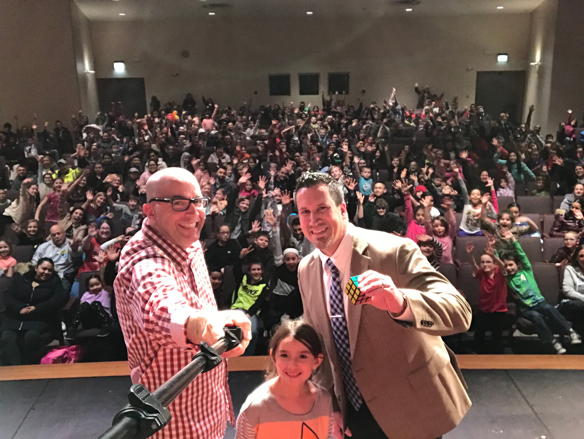 Tim with volunteers and a packed audience at Family Night in Wood Dale