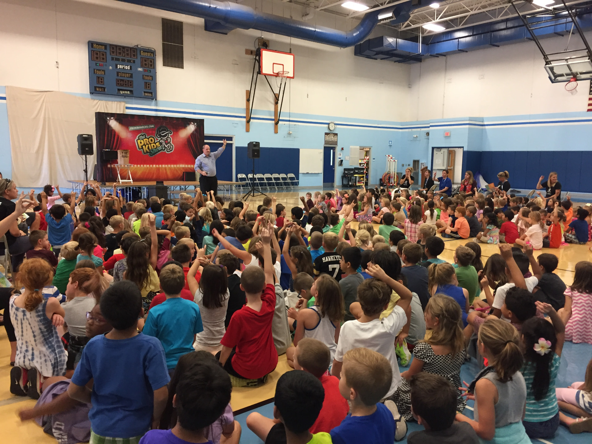 The principal introducing Tim to Prairie View students in 2016