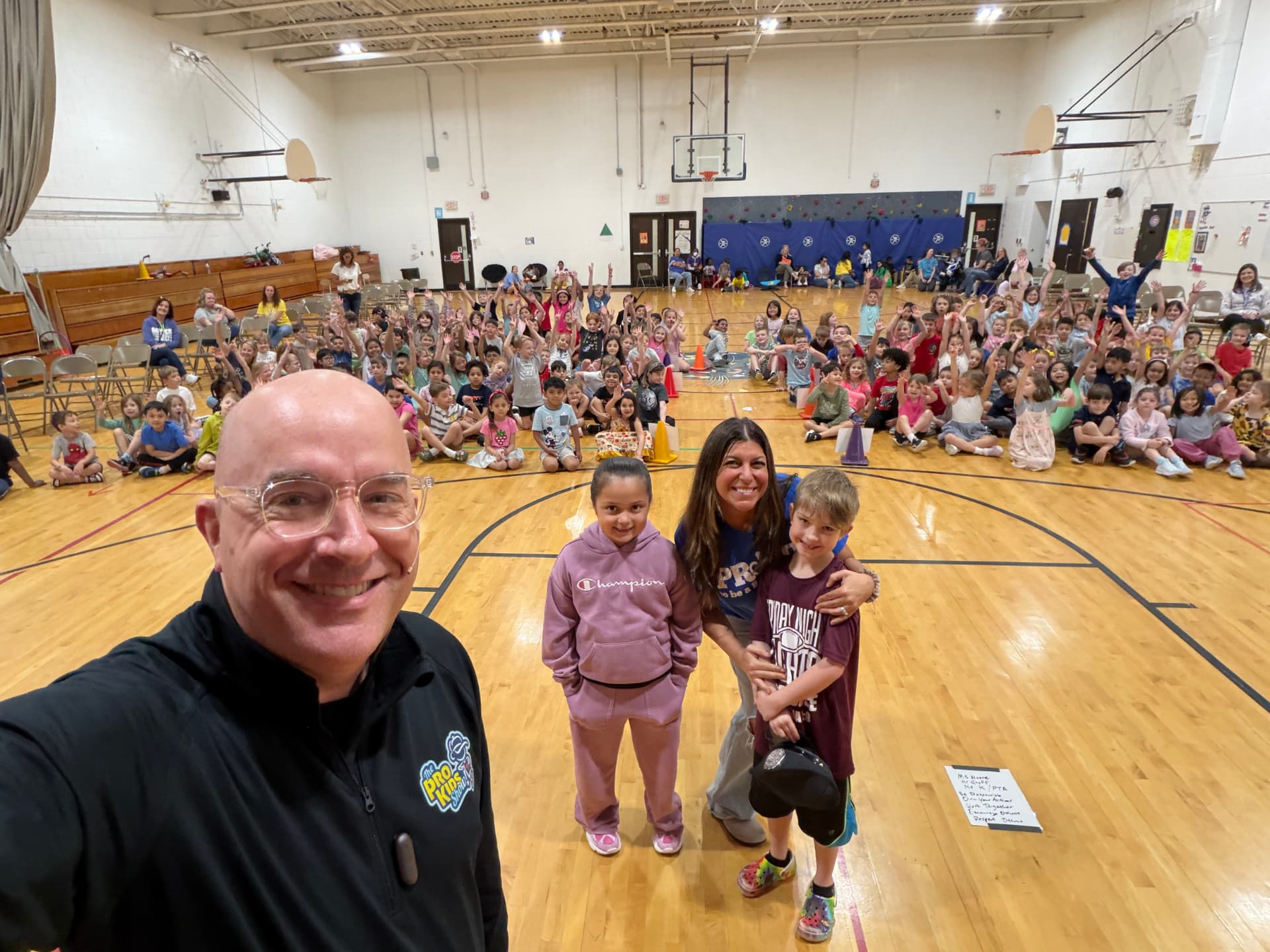 Students and staff at Bower Elementary after a Pro-Kids Show assembly