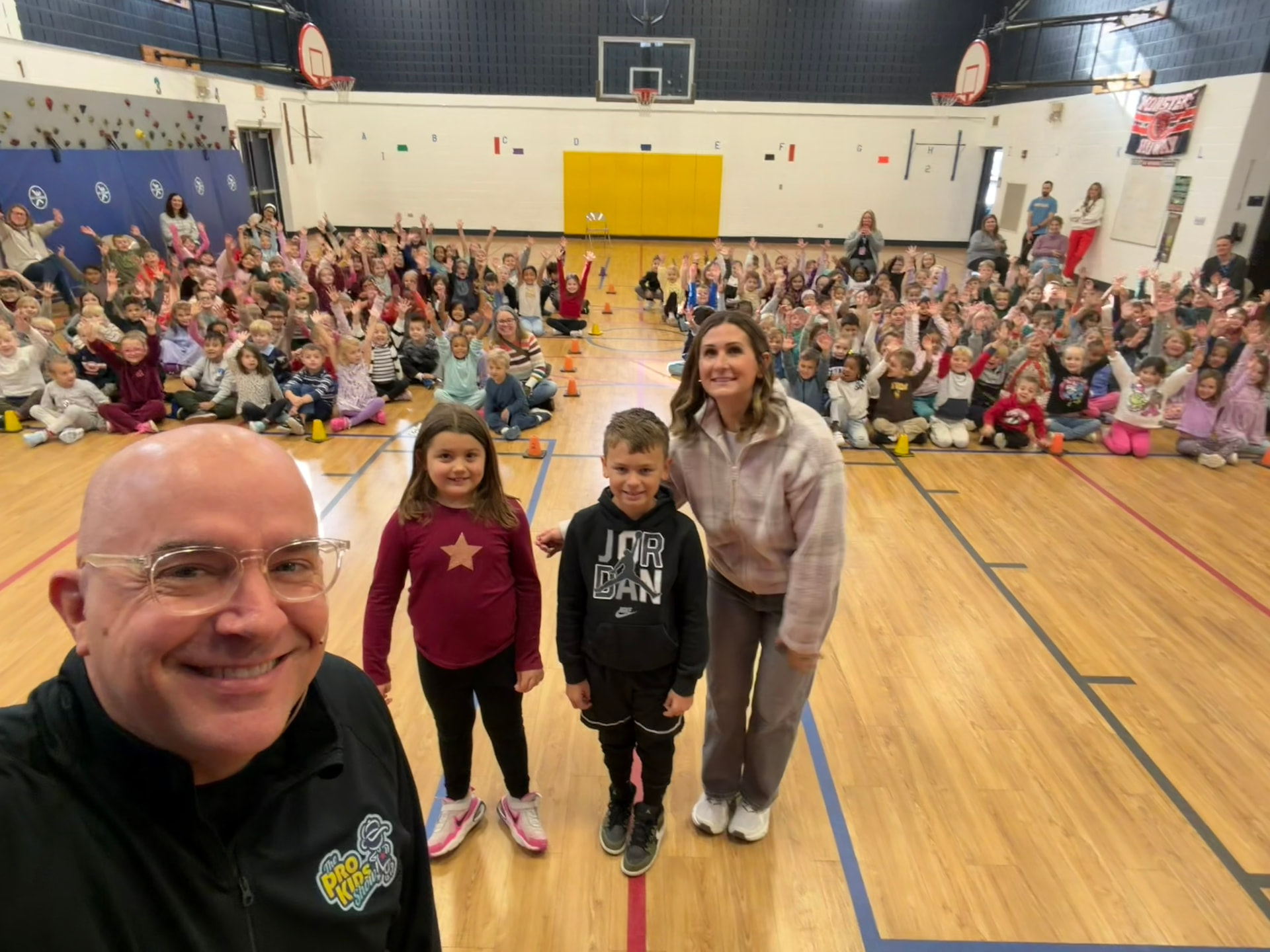 Students and staff at Lincoln Elementary after a Pro-Kids Show assembly
